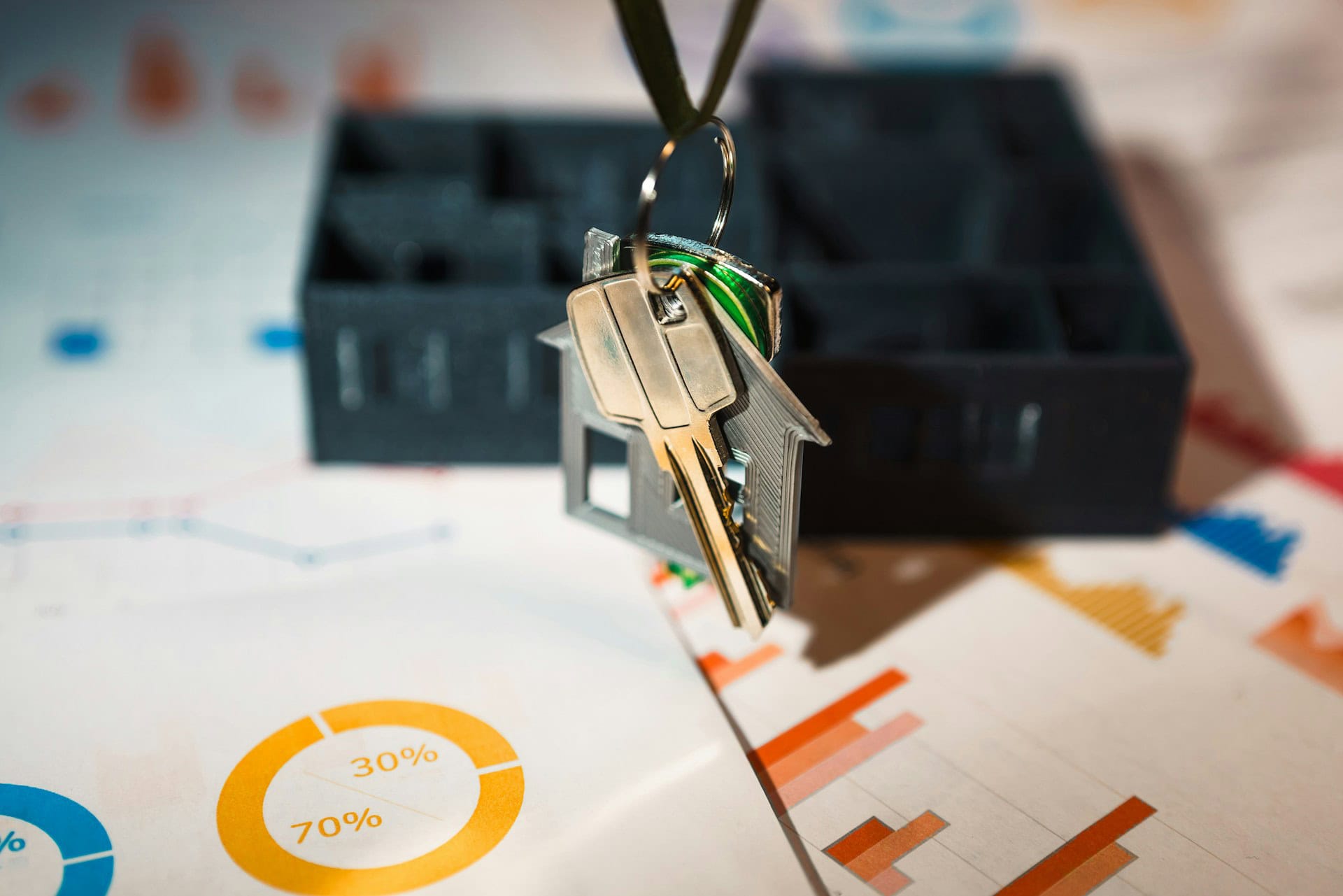model of new build home and keys