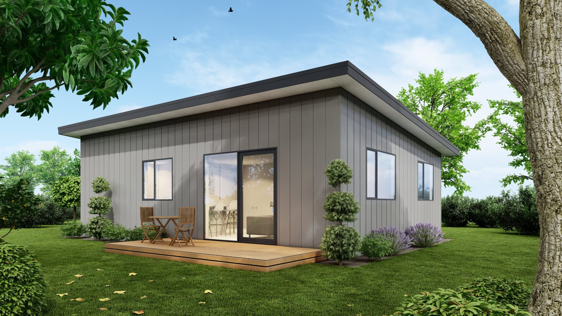 Modern 70m² granny flat built by ZB Homes in New Zealand with timber cladding, a small outdoor deck, and landscaped surroundings.